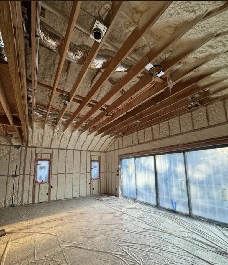 Interior walls and ceiling insulated with spray foam during new construction in Dingman